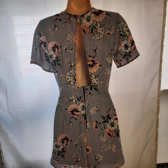 Crystal Doll Black White Ruffled Wrap Romper - Picture 8 of 10